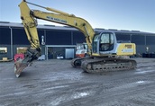 koparka gasienicowa NEW HOLLAND E265  - KOBELCO.  10